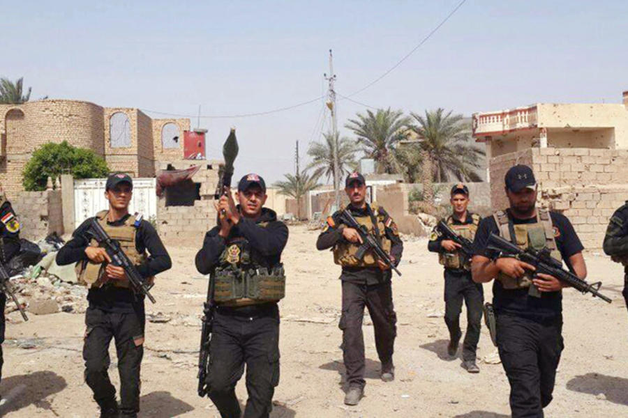 Fuerzas especiales iraquíes en Faluya (© AP Photo Hadi Mizban).