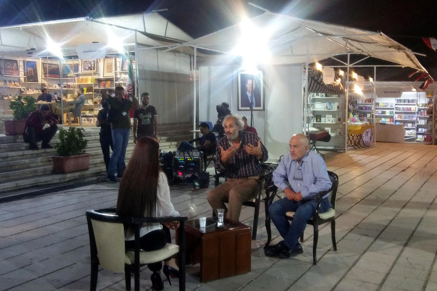 Entrevista en directo a un autor y un editor en la Feria del Libro de Damasco. Foto: Pablo Sapag M