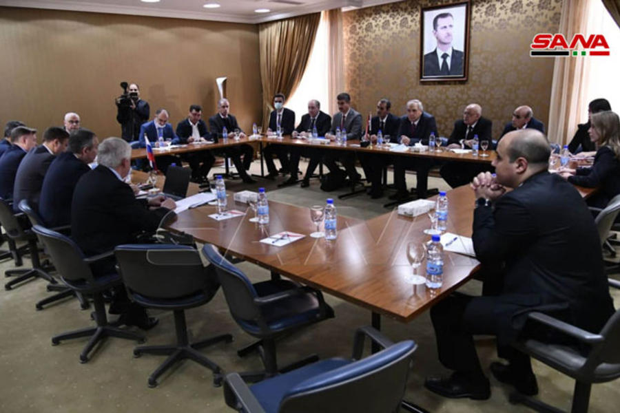 Reunión bilateral sirio-rusa durante la segunda jornada de la Conferencia Internacional (Foto: SANA)