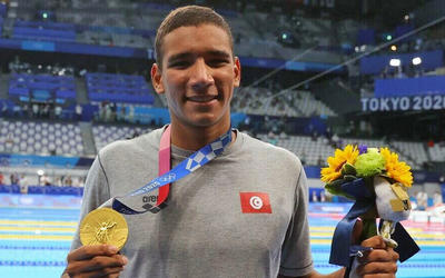 El nadador tunecino Ahmed Hafnaoui consiguió en oro en los 400m de estilo libre masculino. Foto: AFP. El nadador tunecino Ahmed Hafnaoui consiguió en oro en los 400m de estilo libre masculino. Foto: AFP.