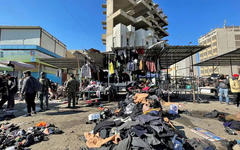 El lugar de un ataque suicida en un mercado central en Bagdad, Irak, 21 de enero 2021. Foto: AFP.