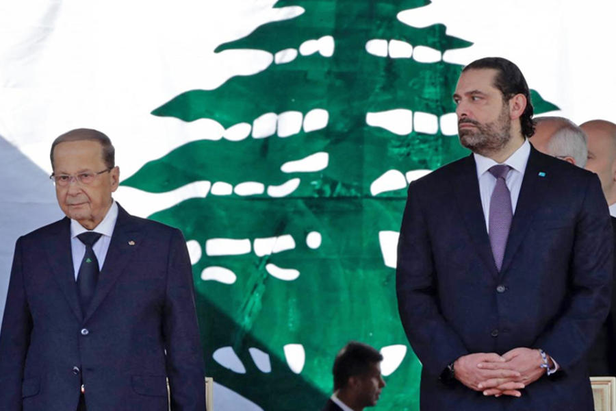 A la izquierda, el presidente Aoun, con el primer ministro designado, Saad Hariri, a la derecha. Foto: EFE.