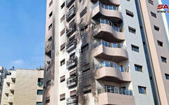 Ataque aéreo del régimen israelí contra un edificio residencial en Kafar Sousah | Damasco, febrero 21, 2024 (Foto: SANA)