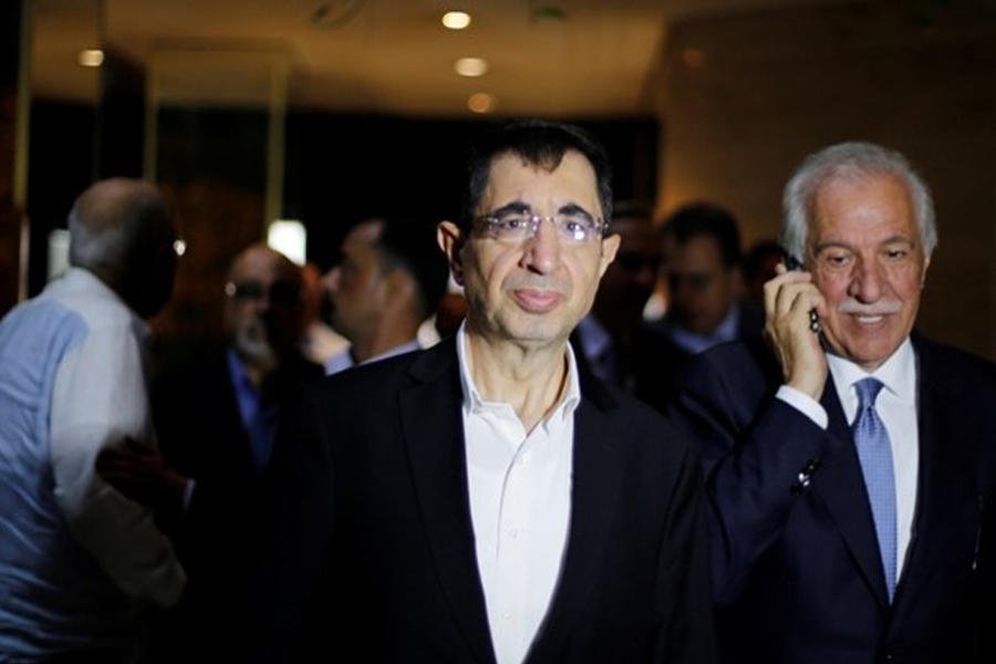 Los ministros libaneses Hussein Hajj Hassan, de Industria (izq.), y Ghazi Zaiter, de Agricultura (der.) arribando a Damasco. Agosto 16, 2017 (Foto Reuters / Omar Sanadiki).