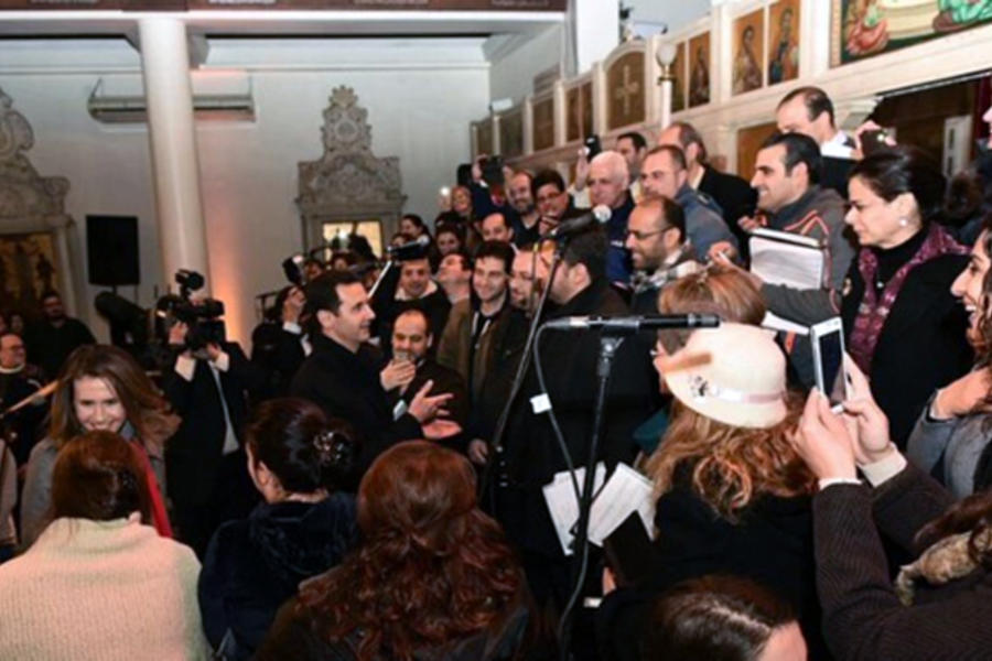 Presidente Al Asad junto a la primera dama Asma Asad visitan la Iglesia Nuestra Señora de Damasco.