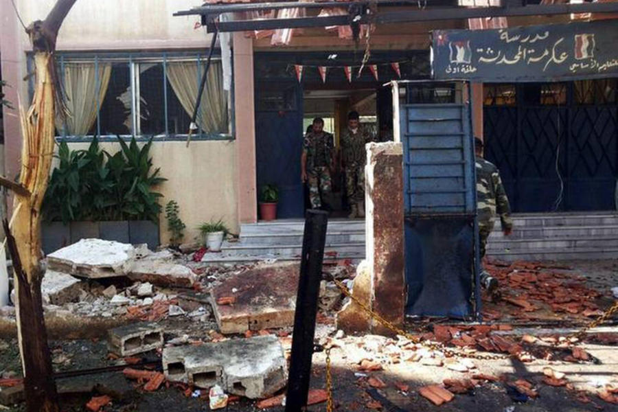 Atentado rebelde en escuela en Homs (2014).