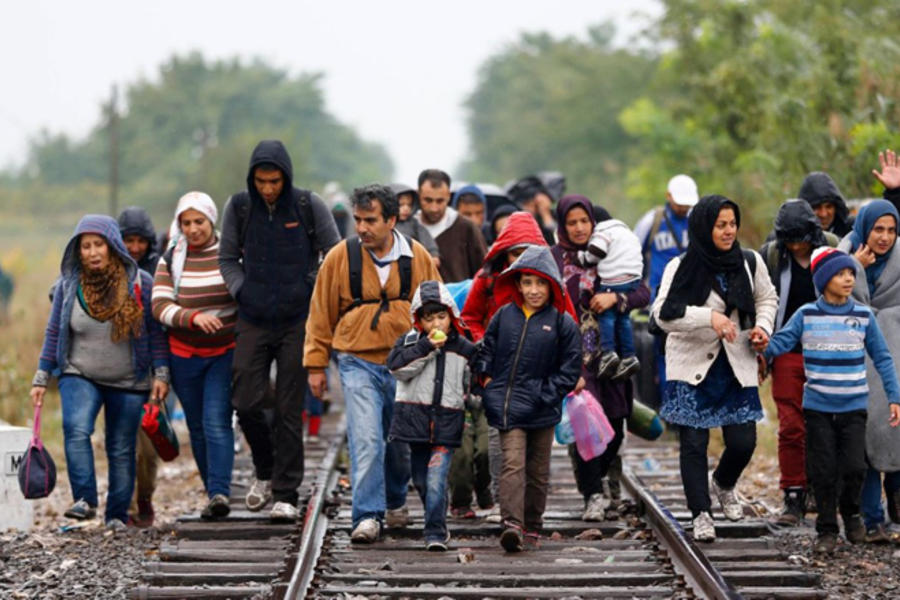 Instantánea de refugiados en la ruta de los Balcanes en Europa (2015).