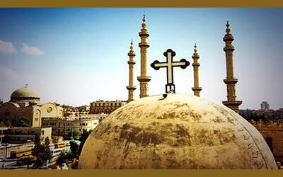 Una iglesia y una mezquita juntas en la ciudad de Alepo (Foto: SANA)